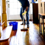 15301-an-african-american-man-mopping-his-home-floor-pv