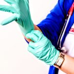 16362-a-healthcare-provider-donning-a-pair-of-latex-gloves-or
