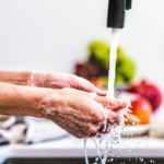 Canva – Person Washing Hands